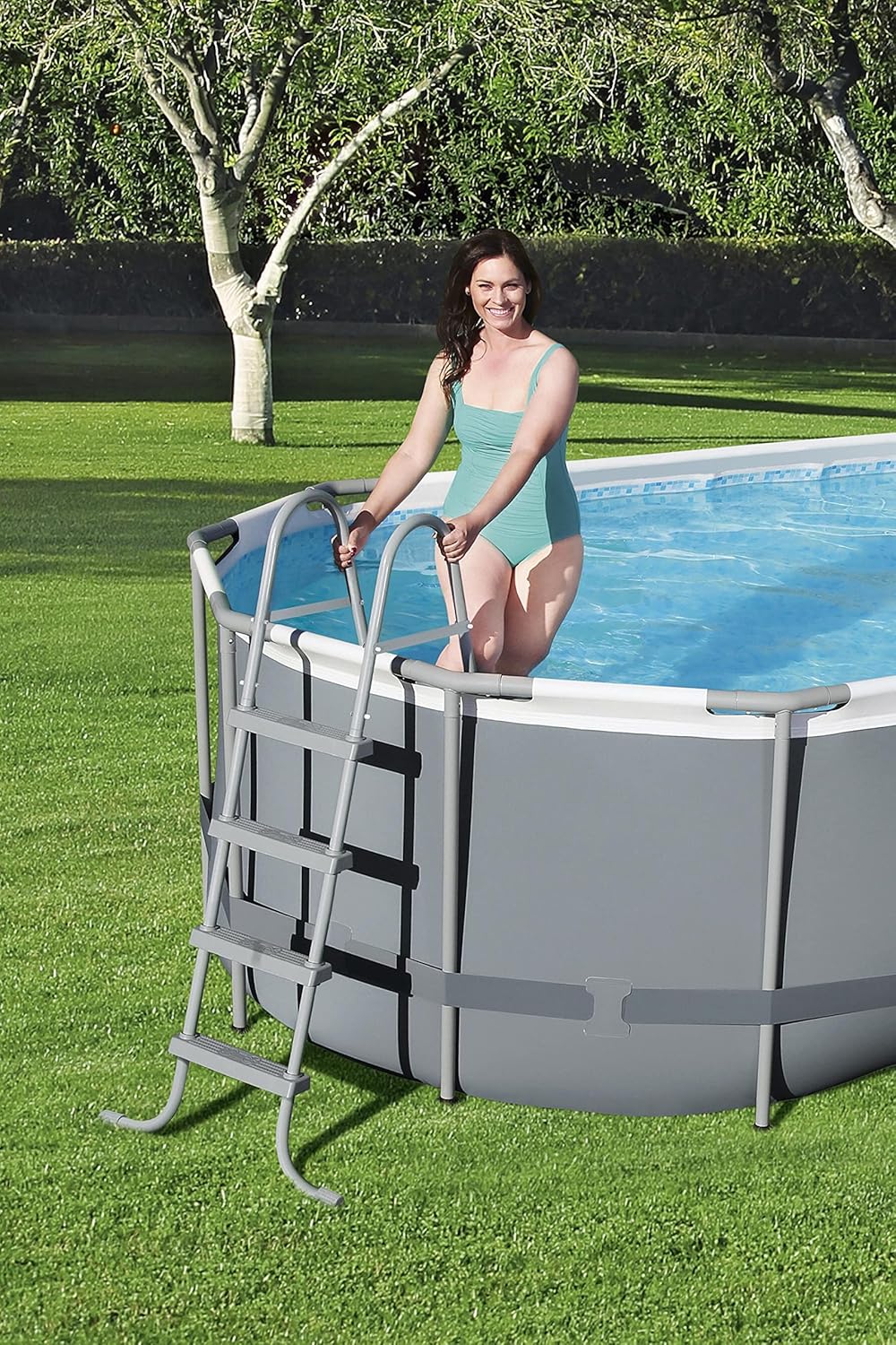 18' x 9' x 48 Outdoor Oval Frame Above Ground Swimming Pool Set with 1500 GPH Cartridge Filter Pump, Cover, & Ladder G2603